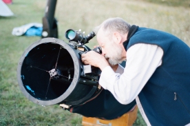Me fiddling with my 12.5" home-made dob in the daytime