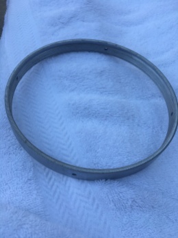 Note that the retaining ring holding the front of the first lens merely slides into the cell; it’s held in place by four screws. The threading is on the inside of the ring, and the outside is smooth
